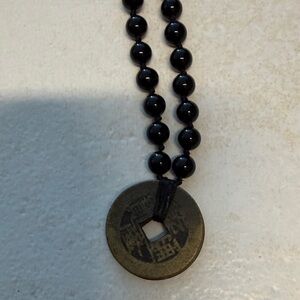 Black Beaded Necklace with Coin Pendant